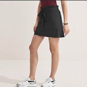 ATHLETA black  skyline skort belted elastic waist size 4 3  pockets stretch